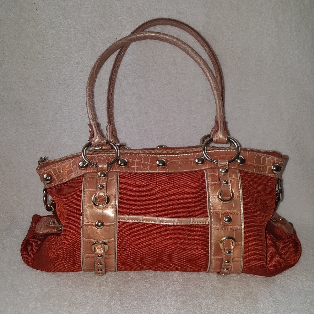 Kathy Van Zeeland orange canvas studded womens han